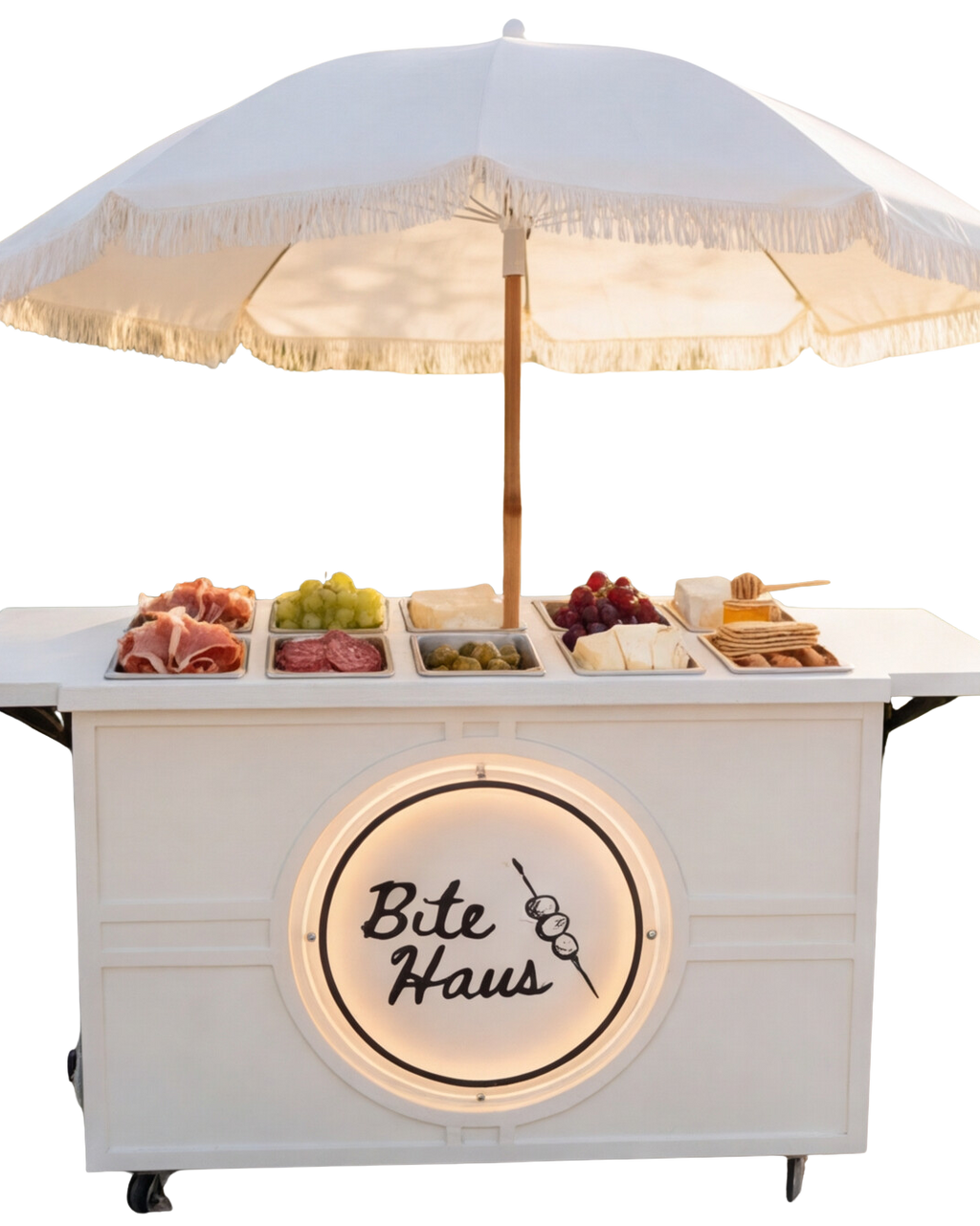 BiteHaus charcuterie cart with cured meats and seasonal accompaniments