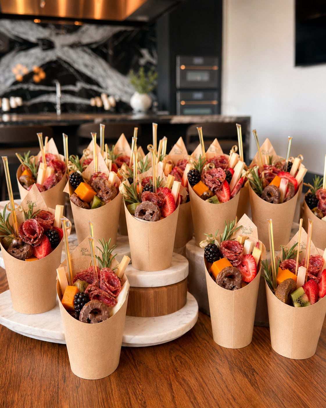 Individual grab-and-go charcuterie cups with artisan cheese, cured meats, and fruit